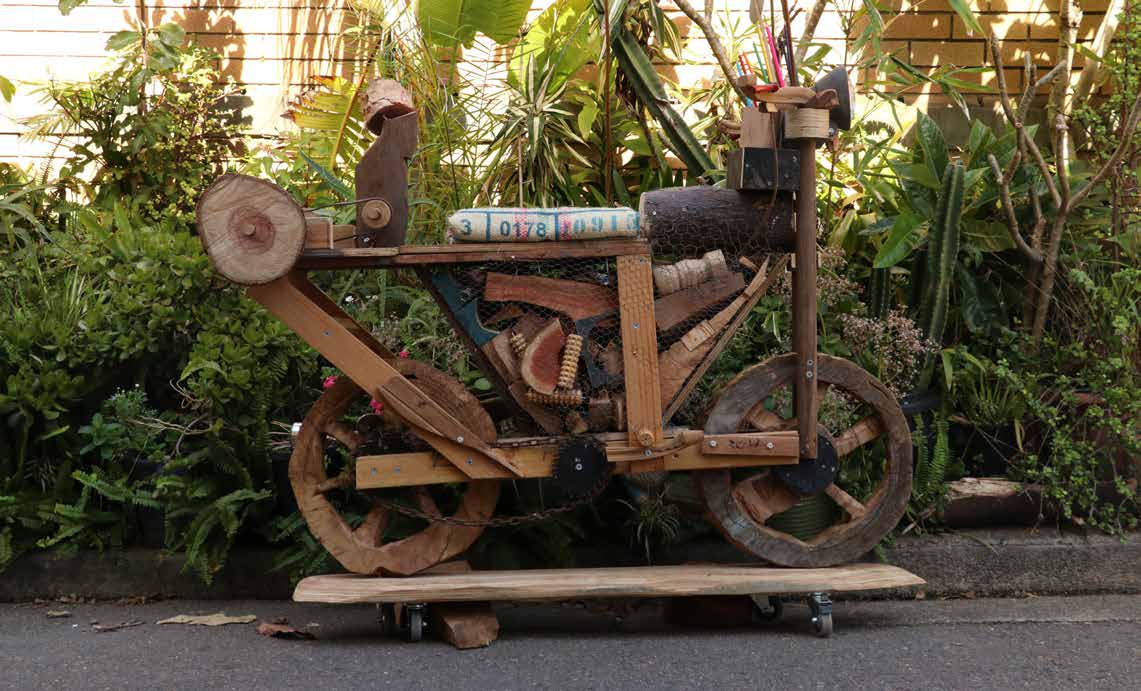 Hilik’s wooden motorcycle replica. Photograph: Orlando Sagar