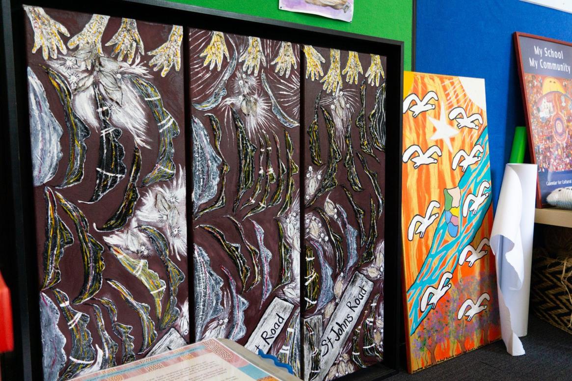 Many of the paintings lining the walls of the Winanggaay room were made by Aunty Kathryn Farrawell who worked with students to create the artworks. Photograph: Sarah Goff-Tunks